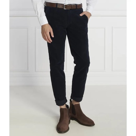 Tommy Hilfiger Spodnie chino BLEECKER CHINO CORDUROY GMD | Slim Fit ze sklepu Gomez Fashion Store w kategorii Spodnie męskie - zdjęcie 185008819