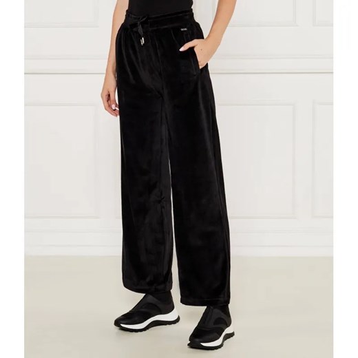 BOSS BLACK Spodnie dresowe Velluto | flare fit ze sklepu Gomez Fashion Store w kategorii Spodnie damskie - zdjęcie 185010275