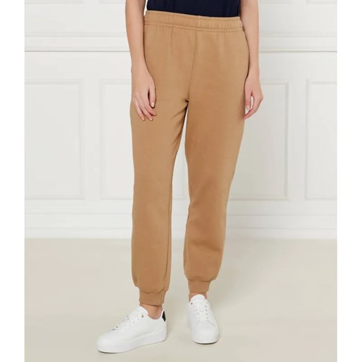 Tommy Hilfiger Spodnie dresowe | Regular Fit ze sklepu Gomez Fashion Store w kategorii Spodnie damskie - zdjęcie 185012848