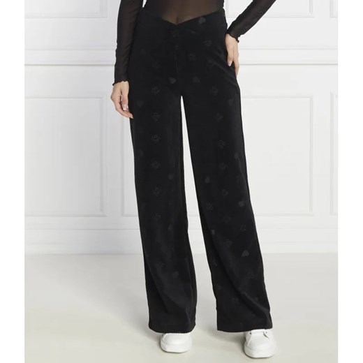 HUGO Spodnie dresowe Navalia | flare fit ze sklepu Gomez Fashion Store w kategorii Spodnie damskie - zdjęcie 185013955