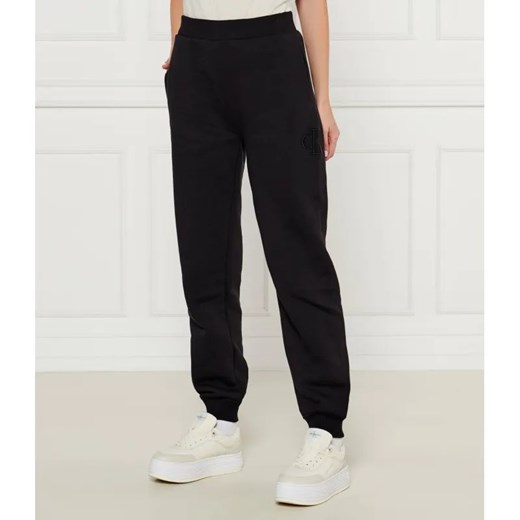 Calvin Klein Jeans Spodnie dresowe | Regular Fit ze sklepu Gomez Fashion Store w kategorii Spodnie damskie - zdjęcie 185014308