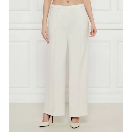 Calvin Klein Spodnie | flare fit | mid rise ze sklepu Gomez Fashion Store w kategorii Spodnie damskie - zdjęcie 185014309