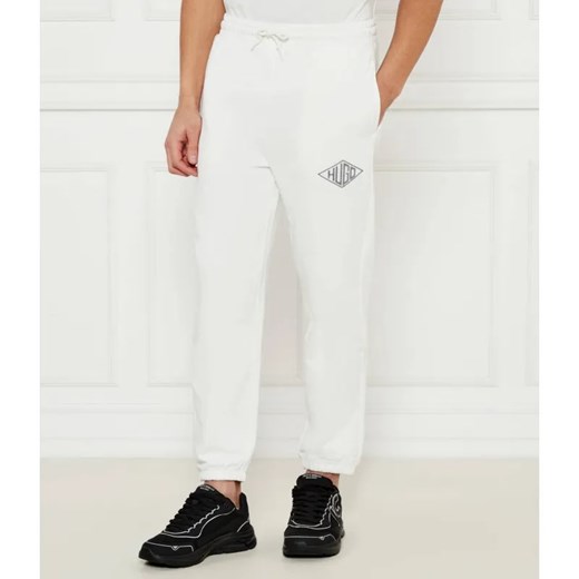 HUGO Spodnie dresowe Dacusi | Loose fit ze sklepu Gomez Fashion Store w kategorii Spodnie męskie - zdjęcie 185015519
