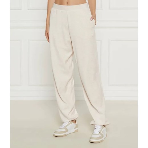 Juicy Couture Spodnie dresowe DAVIDSON GOLD | Relaxed fit ze sklepu Gomez Fashion Store w kategorii Spodnie damskie - zdjęcie 185028895