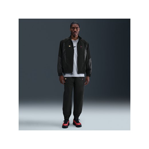 Męskie spodnie z tkaniny Nike Sportswear - Czerń ze sklepu Nike poland w kategorii Spodnie męskie - zdjęcie 185055807