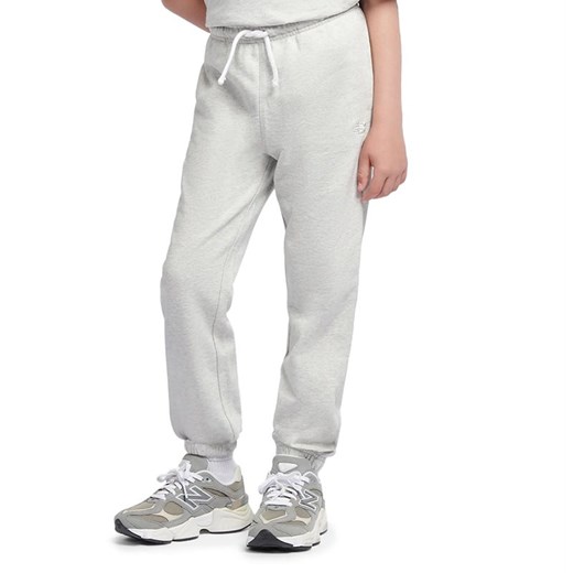 Spodnie dziecięce New Balance LAKB0060AHH - szare ze sklepu streetstyle24.pl w kategorii Spodnie chłopięce - zdjęcie 185057316