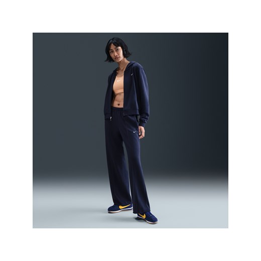 Damskie spodnie dresowe z dzianiny ze średnim stanem i luźnymi nogawkami Nike Sportswear Chill Terry - Niebieski ze sklepu Nike poland w kategorii Spodnie damskie - zdjęcie 185072255