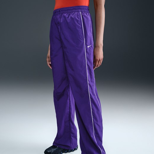 Damskie spodnie z tkaniny z wysokim stanem i luźnymi nogawkami Nike Windrunner - Nike XS (EU 32-34) Nike poland