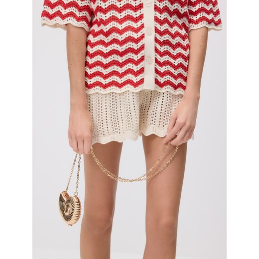 Reserved - Metalowa kopertówka - złoty Reserved ONE SIZE promocyjna cena Reserved