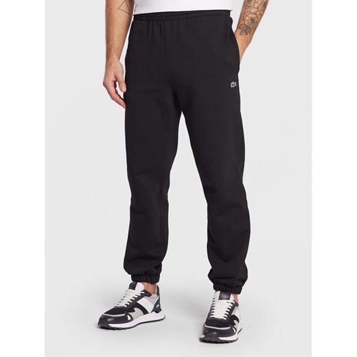 Lacoste Spodnie dresowe XH9610 Czarny Regular Fit ze sklepu MODIVO w kategorii Spodnie męskie - zdjęcie 185384847