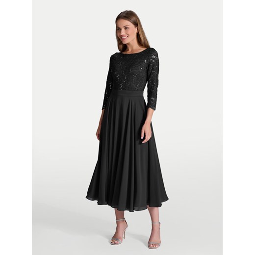 Swing Sukienka koktajlowa 77761710 Czarny Regular Fit ze sklepu MODIVO w kategorii Sukienki - zdjęcie 185384989