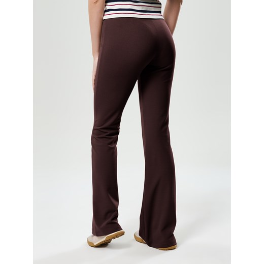 Sinsay - Spodnie flare - fioletowy Sinsay XL Sinsay