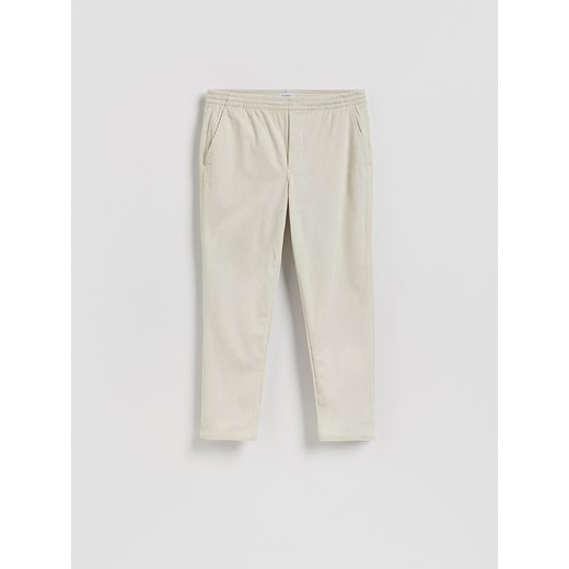 Reserved - Sztruksowe spodnie jogger - złamana biel Reserved L Reserved