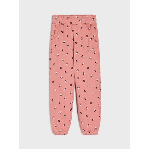 Sinsay - Spodnie dresowe w kwiaty - pomarańczowy Sinsay 122 (6-7 l) Sinsay