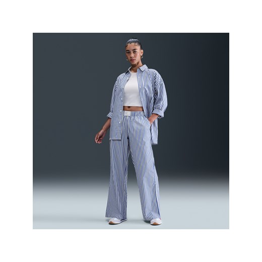 Damskie luźne spodnie w paski ze średnim stanem Nike Sportswear Chill Poplin - Niebieski ze sklepu Nike poland w kategorii Spodnie damskie - zdjęcie 185462017