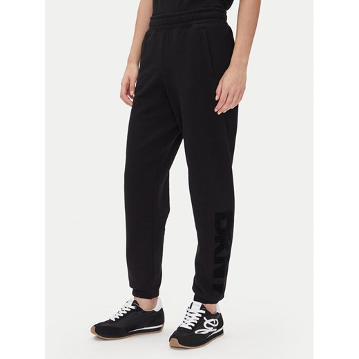 DKNY Sport Spodnie dresowe DP5P3585 Czarny Regular Fit ze sklepu MODIVO w kategorii Spodnie damskie - zdjęcie 185469565