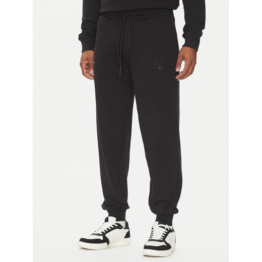Richmond X Spodnie dresowe UMP25008PA Czarny Regular Fit ze sklepu MODIVO w kategorii Spodnie męskie - zdjęcie 185473459