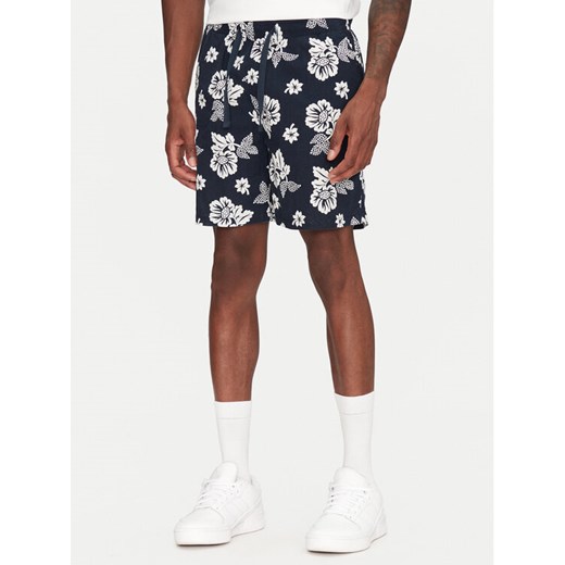 Tommy Jeans Szorty materiałowe Slub Aop Beach DM0DM21947 Granatowy Regular Fit ze sklepu MODIVO w kategorii Spodenki męskie - zdjęcie 185480407