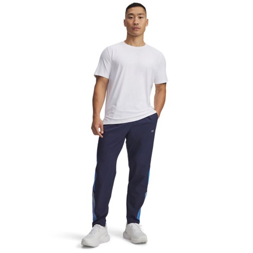 Męskie spodnie do biegania Under Armour  UA Velociti Storm Pant - granatowe ze sklepu Sportstylestory.com w kategorii Spodnie męskie - zdjęcie 185482886