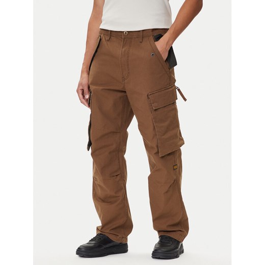 G-Star Raw Spodnie materiałowe R-3N D25224-D191 Brązowy Straight Fit ze sklepu MODIVO w kategorii Spodnie męskie - zdjęcie 185486776