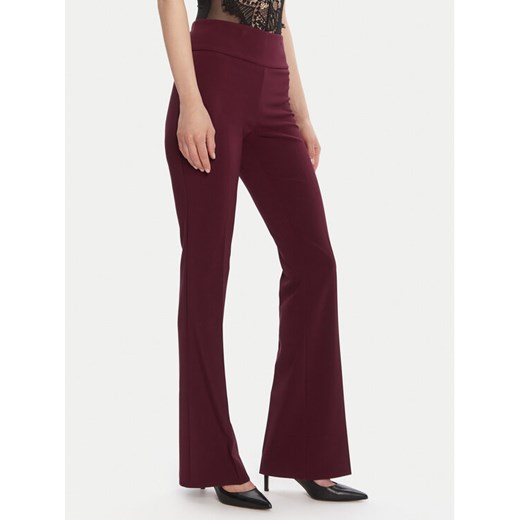 Rinascimento Spodnie materiałowe CFC0125318003 Bordowy Flare Fit ze sklepu MODIVO w kategorii Spodnie damskie - zdjęcie 185486927