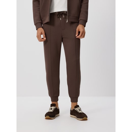 Reserved - Spodnie dresowe slim fit - beżowy ze sklepu Reserved w kategorii Spodnie męskie - zdjęcie 185506288