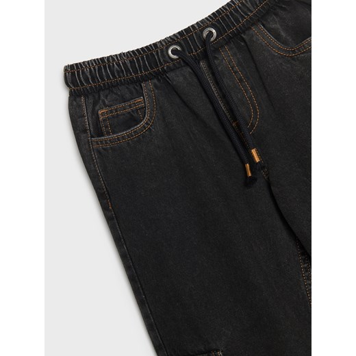 Sinsay - Jeansy cargo - czarny Sinsay 134 (8-9 l) Sinsay