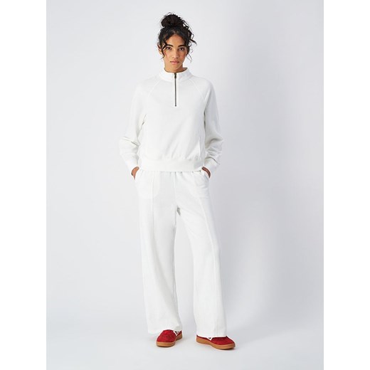 Champion Spodnie dresowe w kolorze białym Champion XL okazja Limango Polska