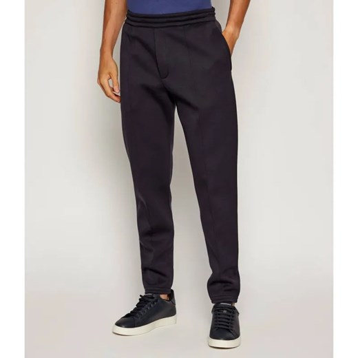 Emporio Armani Spodnie dresowe Travel Essentials | Regular Fit | z dodatkiem wełny ze sklepu Gomez Fashion Store w kategorii Spodnie męskie - zdjęcie 185550308
