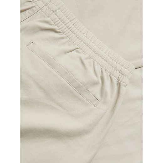 Reserved - Spodnie jogger slim - złamana biel Reserved S Reserved