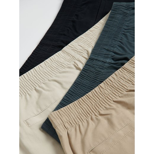 Reserved - Spodnie jogger slim - złamana biel Reserved S Reserved