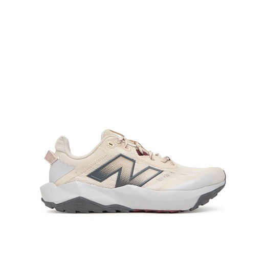 New Balance Buty do biegania Nitrel WTNTRCC6 Beżowy ze sklepu MODIVO w kategorii Buty sportowe damskie - zdjęcie 185588459