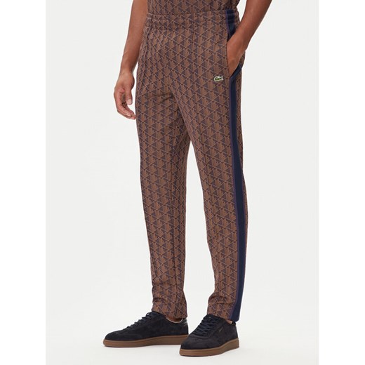 Lacoste Spodnie dresowe XH1440 Brązowy Regular Fit ze sklepu MODIVO w kategorii Spodnie męskie - zdjęcie 185635007