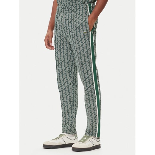 Lacoste Spodnie dresowe XH1440 Zielony Regular Fit ze sklepu MODIVO w kategorii Spodnie męskie - zdjęcie 185635078
