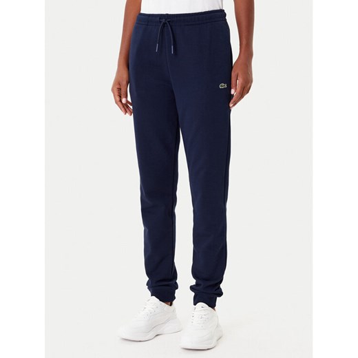 Lacoste Spodnie dresowe XF9216 Granatowy Regular Fit ze sklepu MODIVO w kategorii Spodnie damskie - zdjęcie 185653845