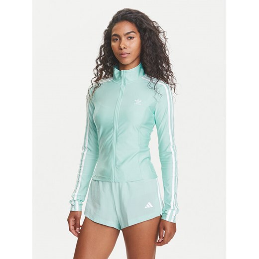 adidas Bluza adicolor 3-Stripes JC5579 Turkusowy Slim Fit ze sklepu MODIVO w kategorii Bluzy damskie - zdjęcie 185665715