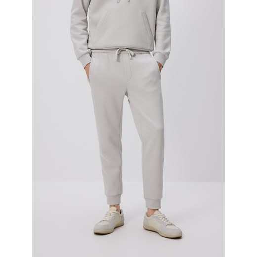 Reserved - Spodnie dresowe slim fit - jasnoszary ze sklepu Reserved w kategorii Spodnie męskie - zdjęcie 185677676