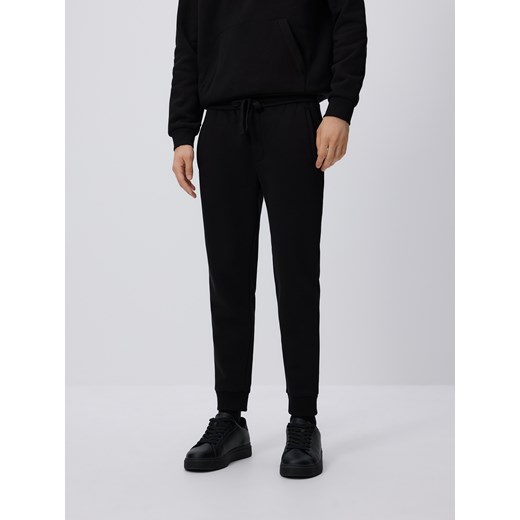 Reserved - Spodnie dresowe slim fit - czarny ze sklepu Reserved w kategorii Spodnie męskie - zdjęcie 185677687
