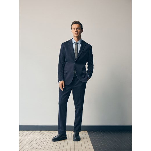 Reserved - Spodnie garniturowe slim fit - granatowy ze sklepu Reserved w kategorii Spodnie męskie - zdjęcie 185690548