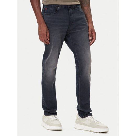 HUGO Jeansy 50547251 Granatowy Extra Slim Fit ze sklepu MODIVO w kategorii Jeansy męskie - zdjęcie 185713809