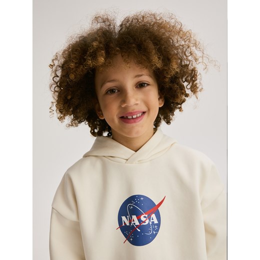 Reserved - Bluza NASA - złamana biel Reserved 122/128 (6-8 lat) wyprzedaż Reserved