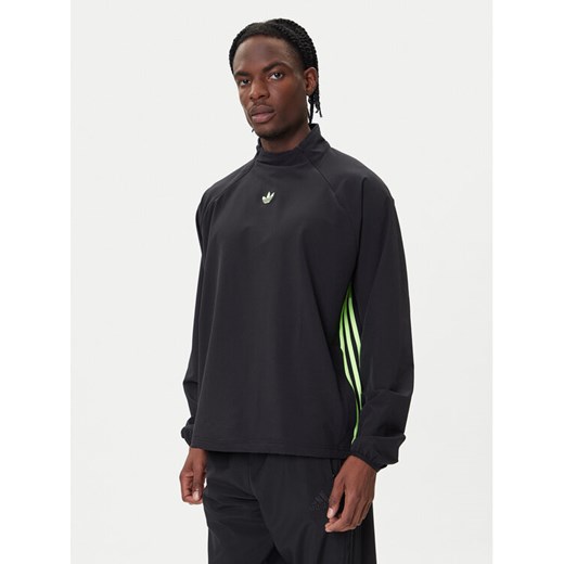 adidas Bluza adicolor Woven Drill JW5957 Czarny Loose Fit ze sklepu MODIVO w kategorii Bluzy męskie - zdjęcie 185741405