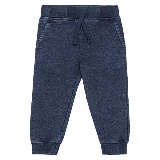 Guess Spodnie dresowe N5YQ14 KCYC0 Granatowy Regular Fit ze sklepu MODIVO w kategorii Spodnie chłopięce - zdjęcie 185741489