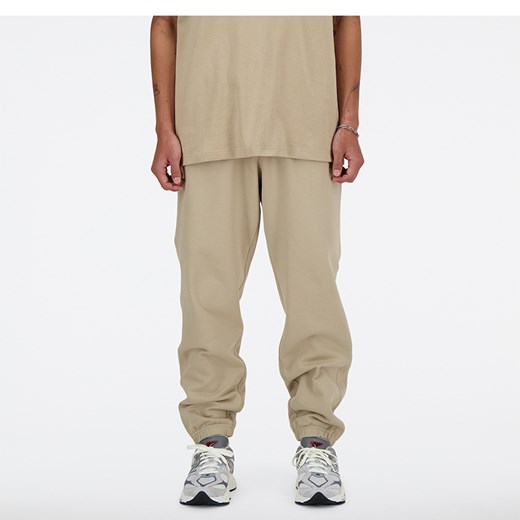 Spodnie męskie New Balance MP41508SOT – beżowe ze sklepu New Balance Poland w kategorii Spodnie męskie - zdjęcie 185752569