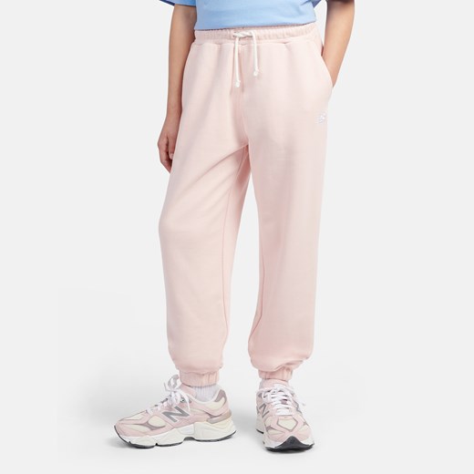 Spodnie dziecięce New Balance LAKG0058PIE – różowe ze sklepu New Balance Poland w kategorii Spodnie dziewczęce - zdjęcie 185754049