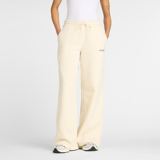 Spodnie damskie New Balance WP53903LIN – beżowe ze sklepu New Balance Poland w kategorii Spodnie damskie - zdjęcie 185754089