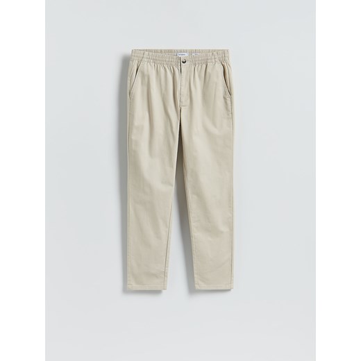 Reserved - Spodnie jogger slim - złamana biel ze sklepu Reserved w kategorii Spodnie męskie - zdjęcie 185756625