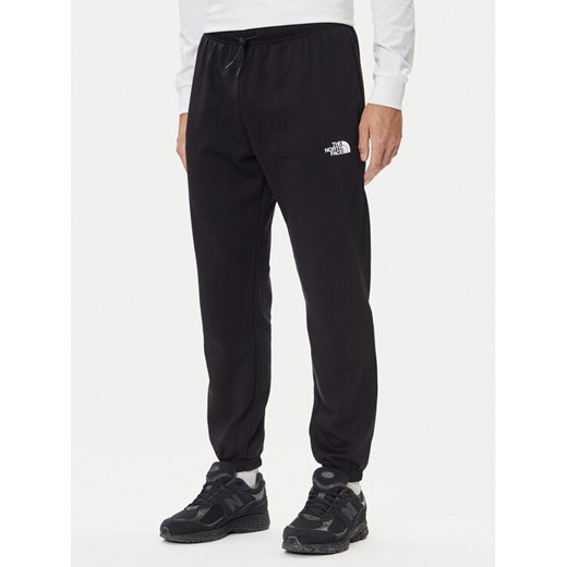 The North Face Spodnie dresowe Simple Dome NF0A8C1W Czarny Regular Fit ze sklepu MODIVO w kategorii Spodnie męskie - zdjęcie 185792859