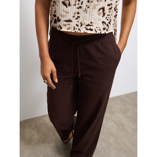 Mohito - Bawełniane brązowe spodnie - brązowy Mohito 36 Mohito