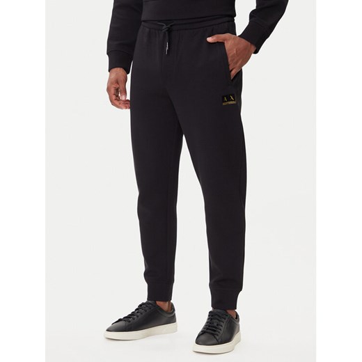 Armani Exchange Spodnie dresowe XM001886 AF10818 MC004 Czarny Slim Fit ze sklepu MODIVO w kategorii Spodnie męskie - zdjęcie 185869507